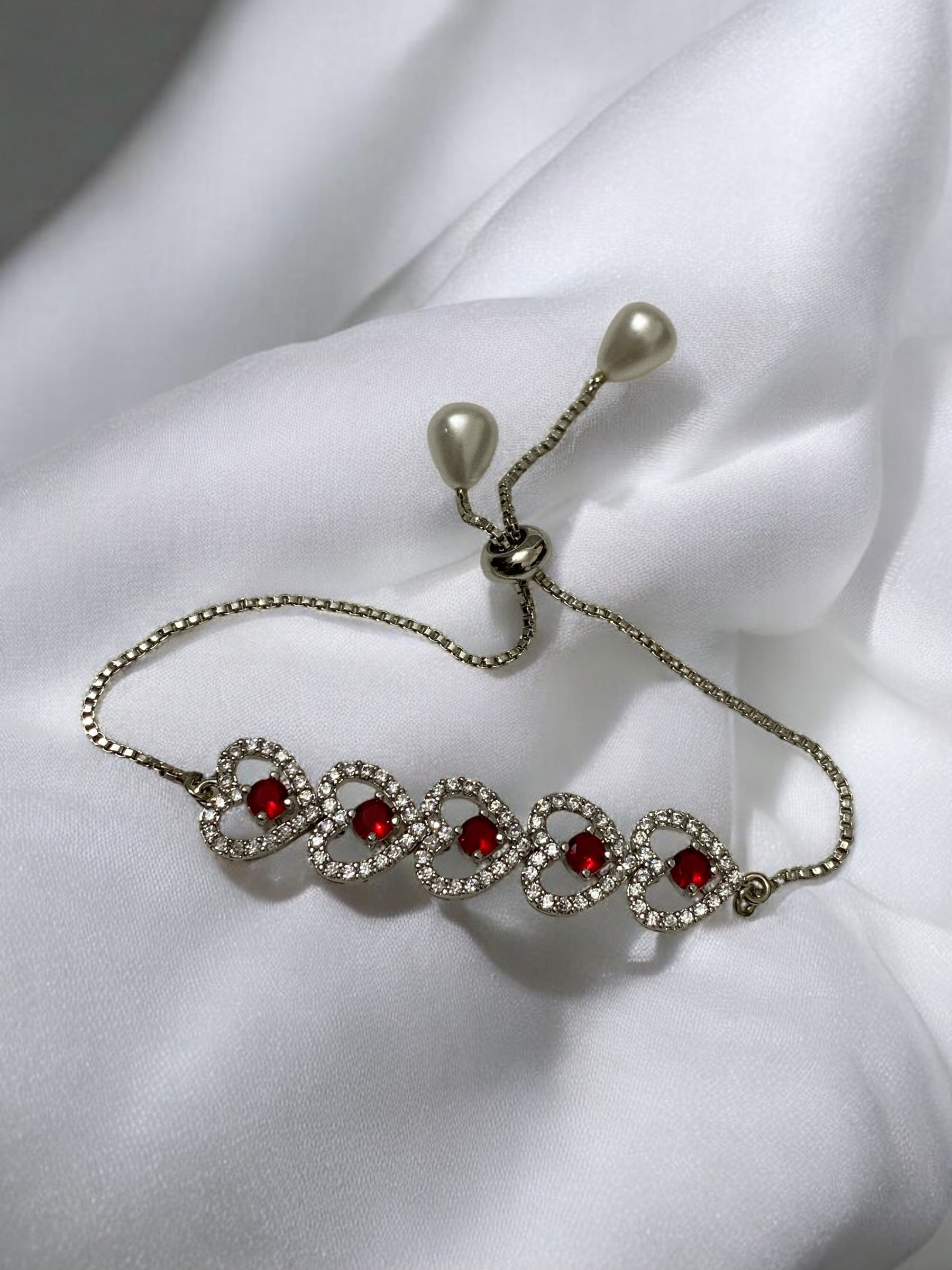 Charming Adjustable Chain Bracelet with Heart Design, American Diamonds, Pearls, and Maroon Stone